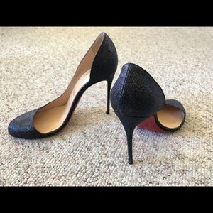 Black glitter Christian Louboutin helmour pumps.